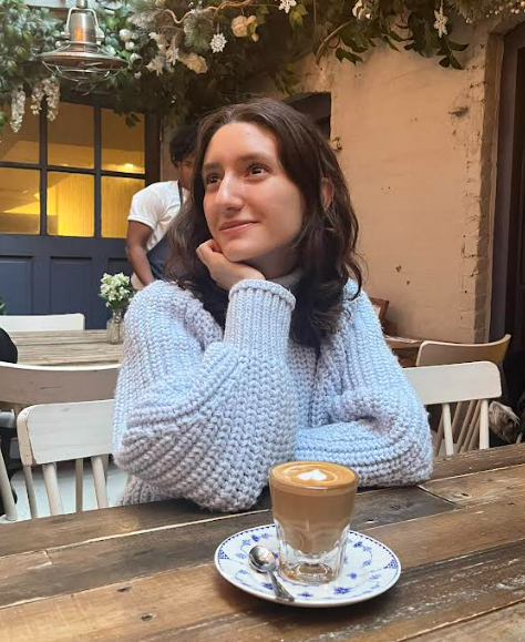 Abby Welch sitting at a cafe in New York City